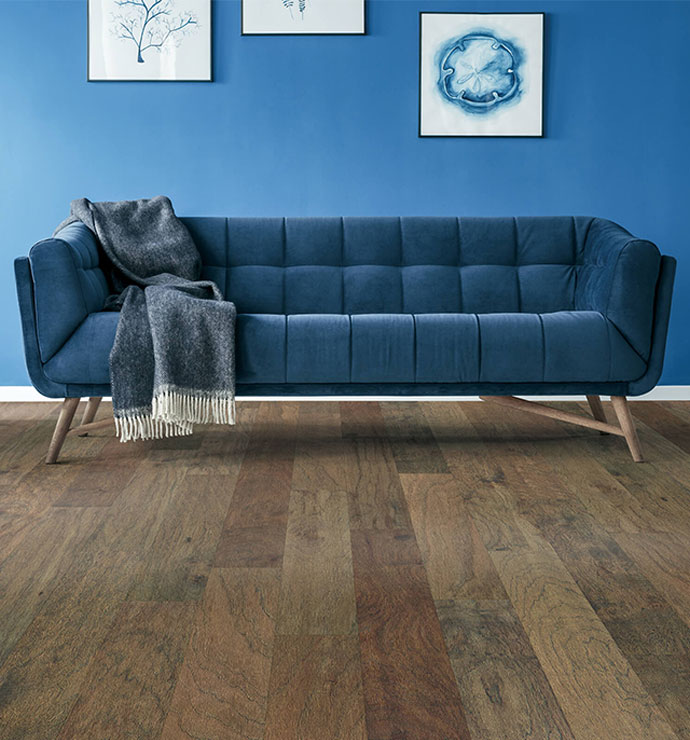 Blue couch on flooring | Northwest Flooring Gallery